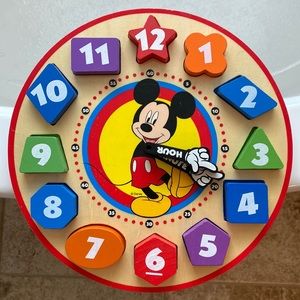 Melissa & Doug shape-sorting clock